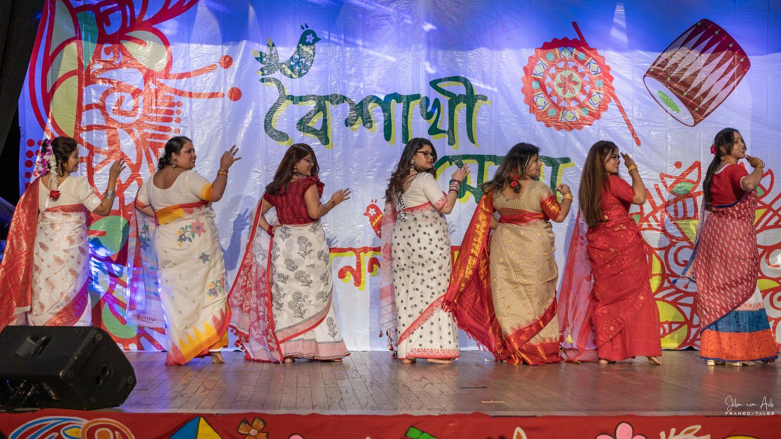 Seven women in a line dance