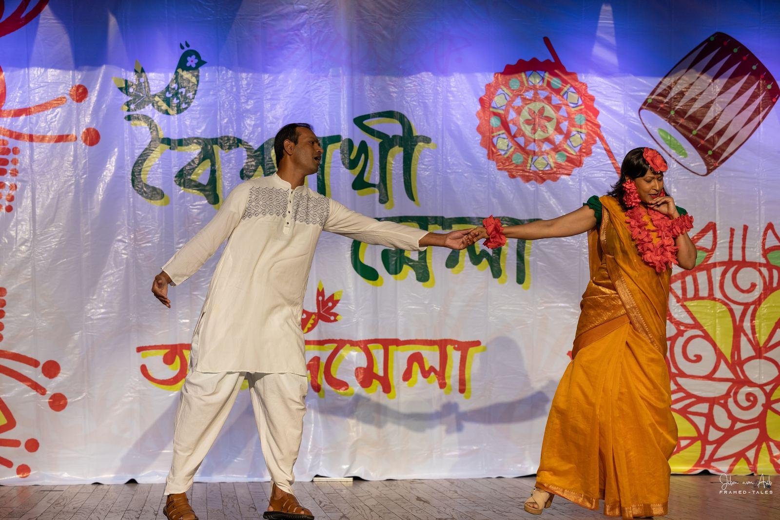 Couple dance, arms extended, lively